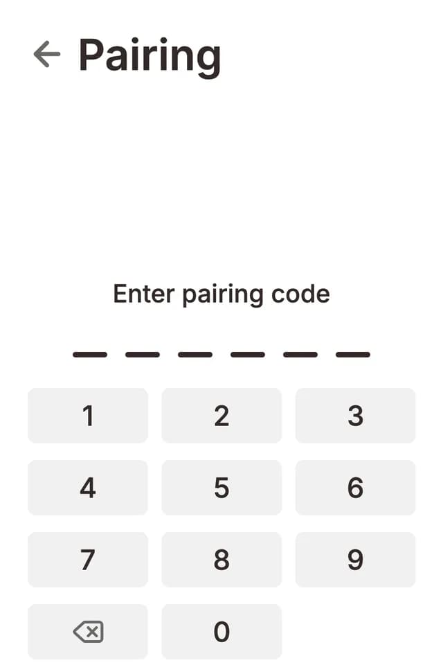 Pairing screen on a Flush unit showing the dialpad for entering the Grolia account pairing code